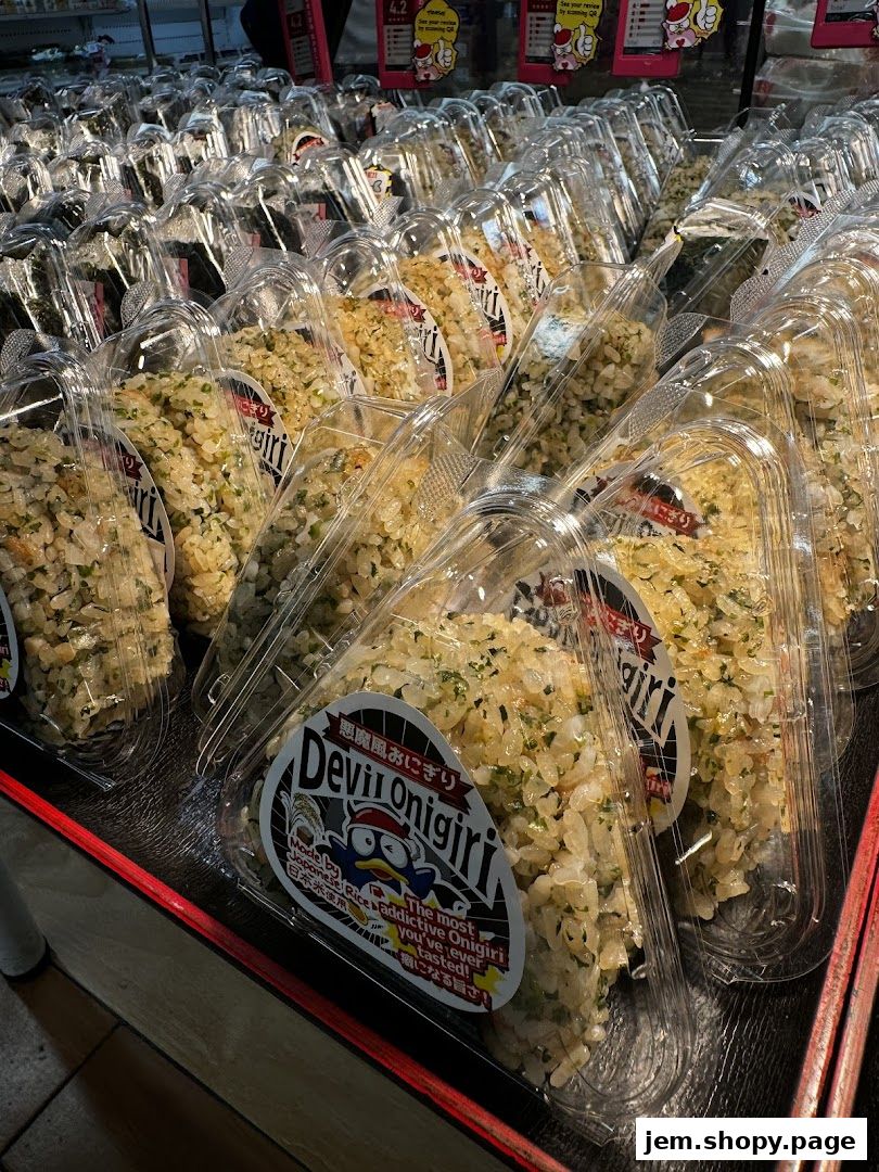 Rows of individually packaged onigiri rice balls with a 'Devil Onigiri' label.