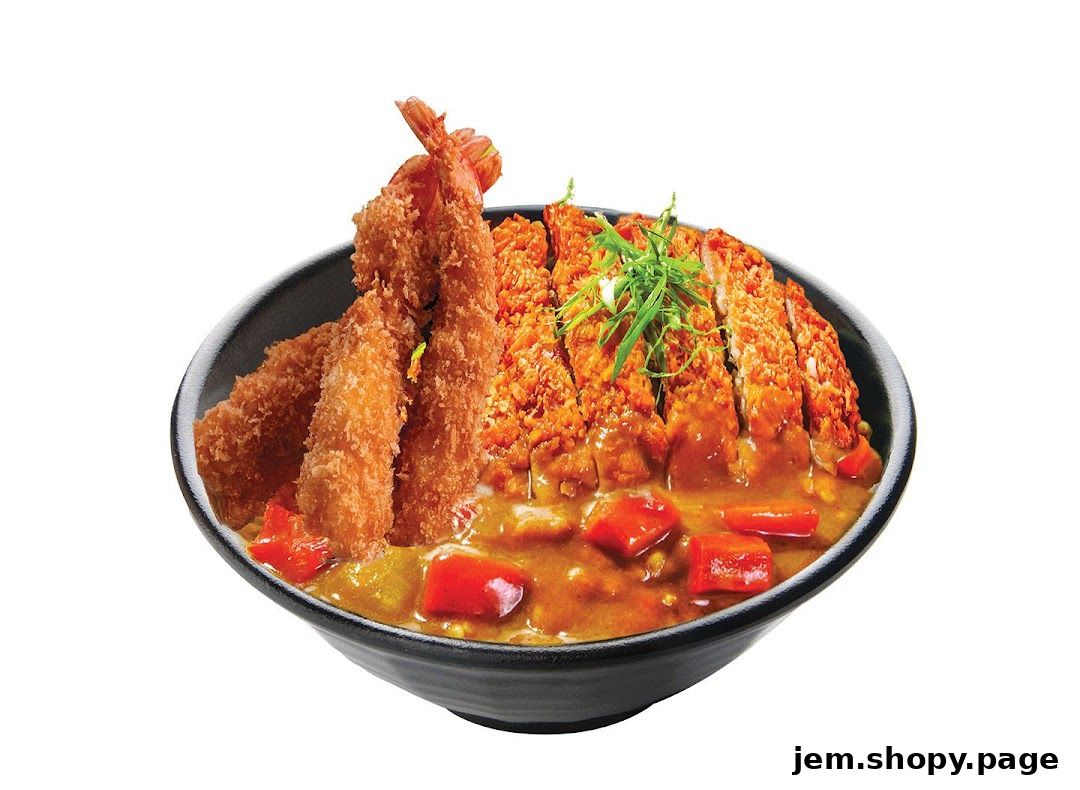 A bowl of Japanese curry with crispy fried chicken and shrimp.