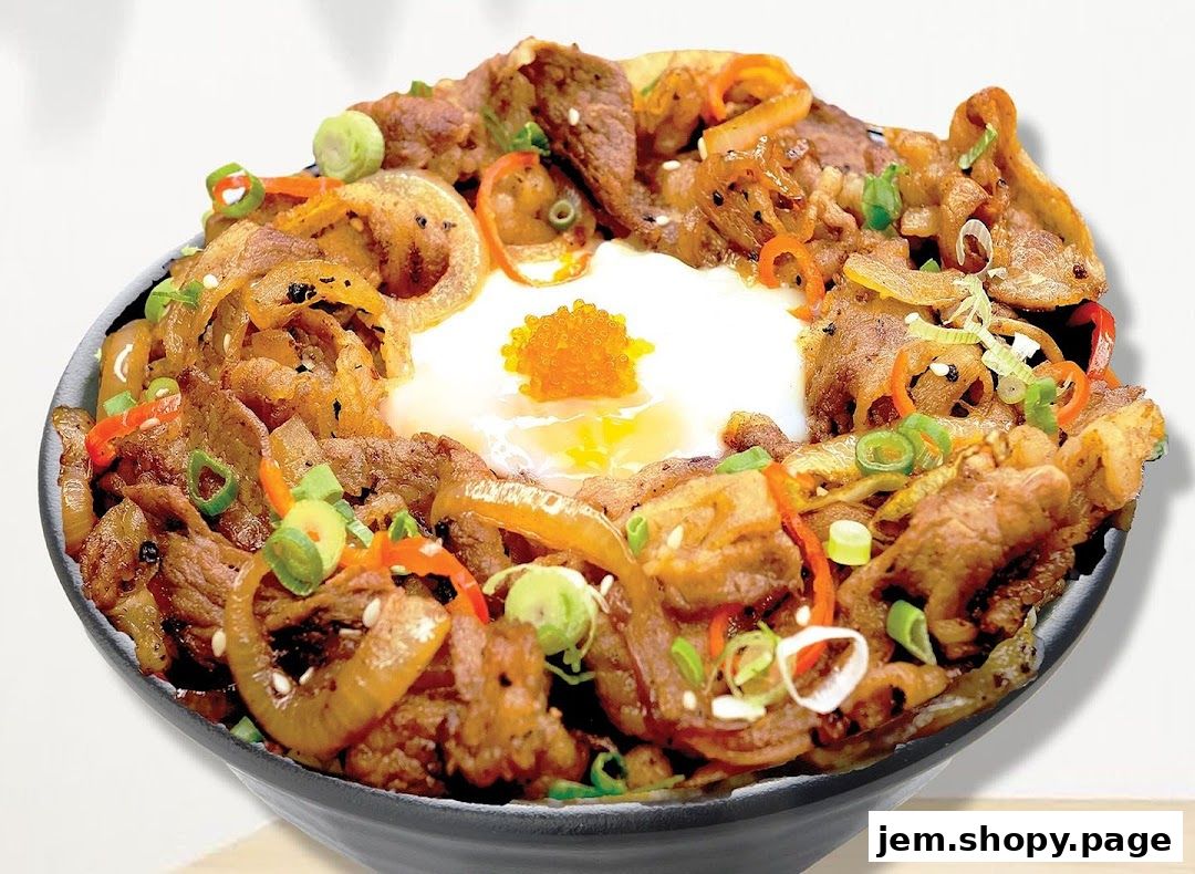 A close-up of a delicious beef bowl with a runny egg and roe.