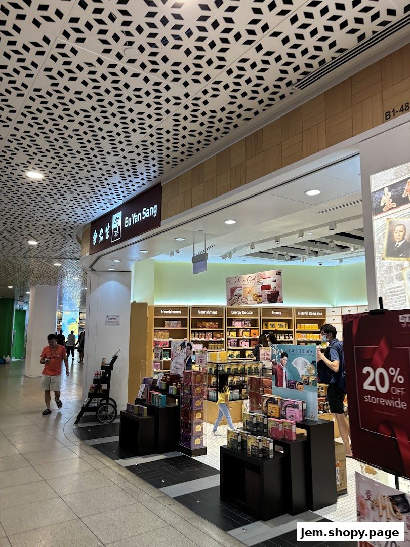 Eu Yan Sang shop interior with shelves stocked with health products and a storewide discount.