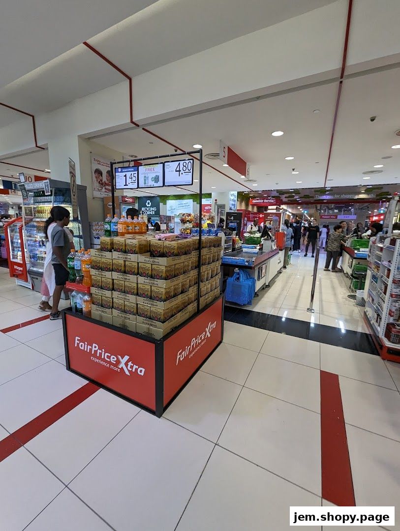 Interior view of a FairPrice Xtra supermarket with product displays and shoppers.