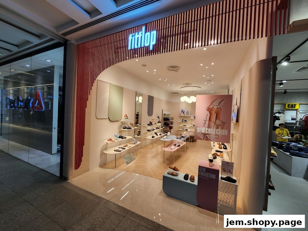 The entrance of a FitFlop Jem shoe store displaying a new collection.