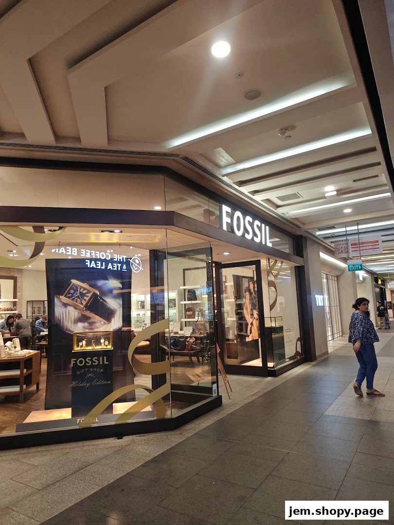 The Fossil store entrance showcases watches and accessories with a prominent 'Fossil' sign.