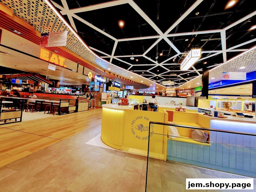 A bright and modern food court with various eateries and seating areas.