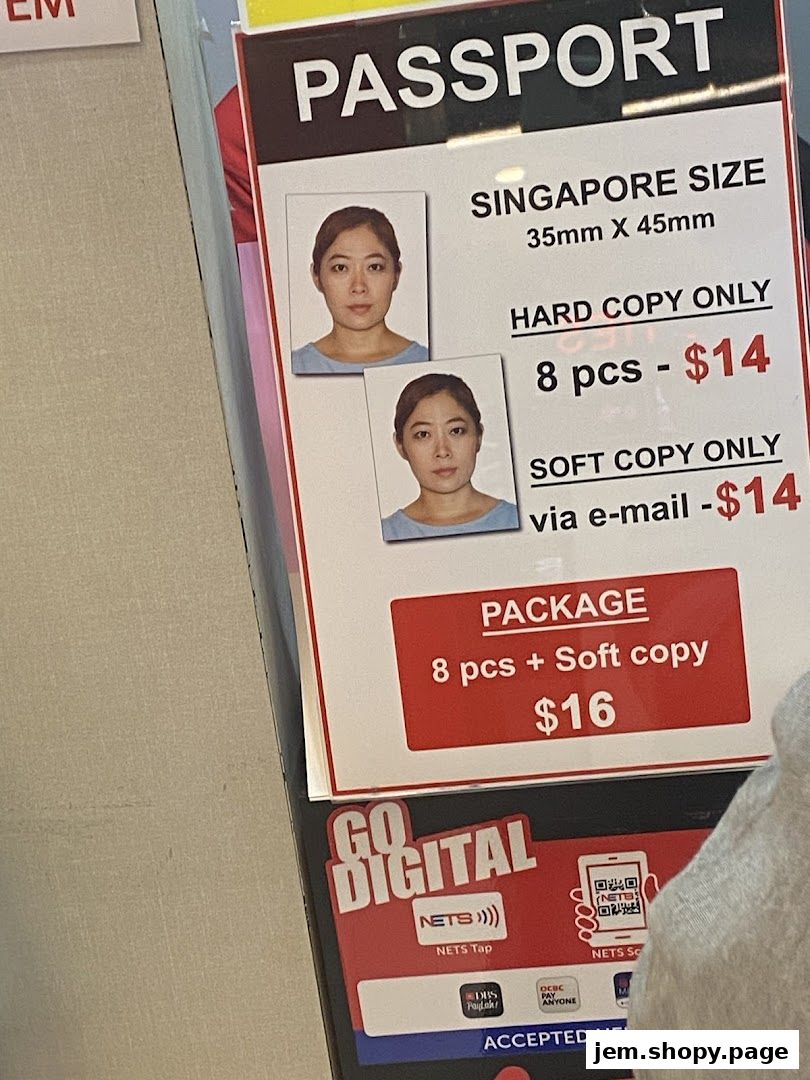 A sign displays prices for passport photos, including hard copy, soft copy, and package deals.