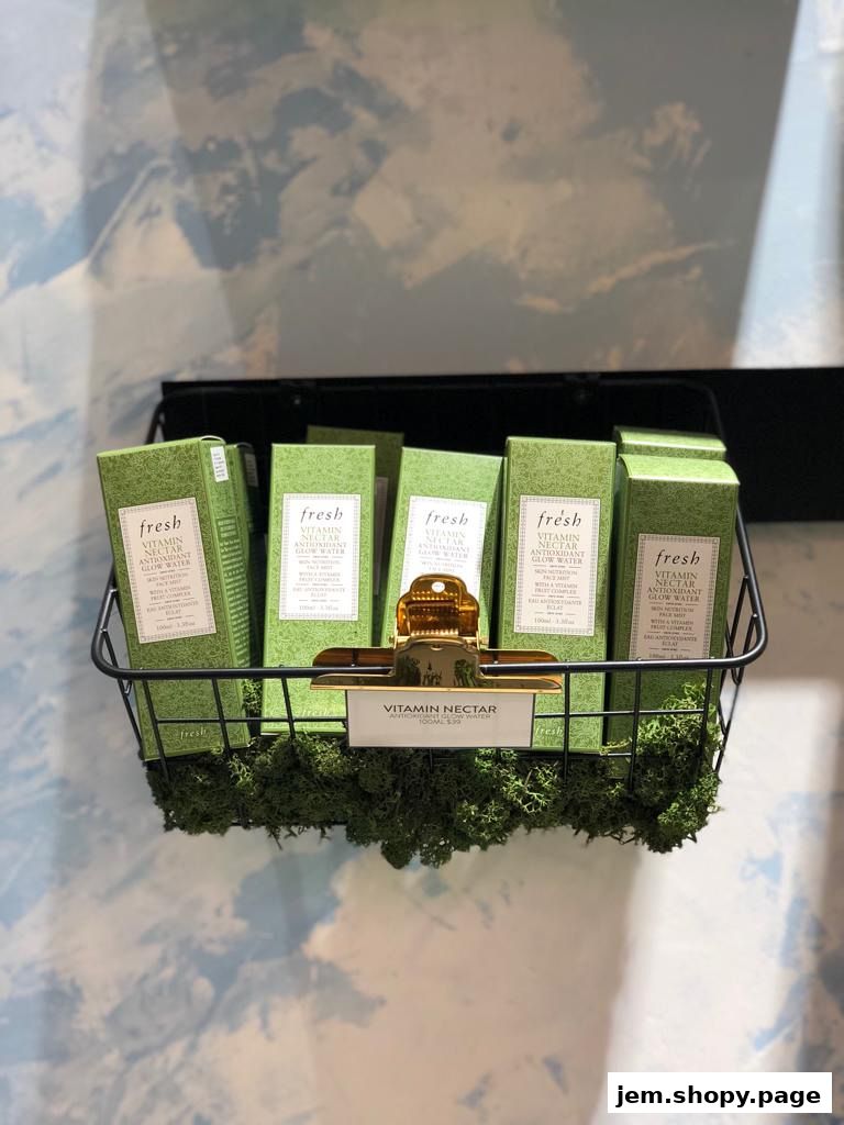 A basket filled with Fresh Vitamin Nectar Antioxidant Glow Water products.