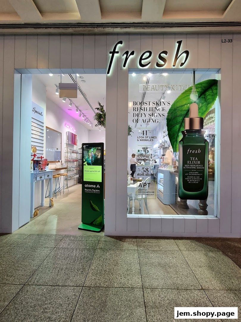Exterior view of the 'Fresh' beauty store entrance with product displays and signage.