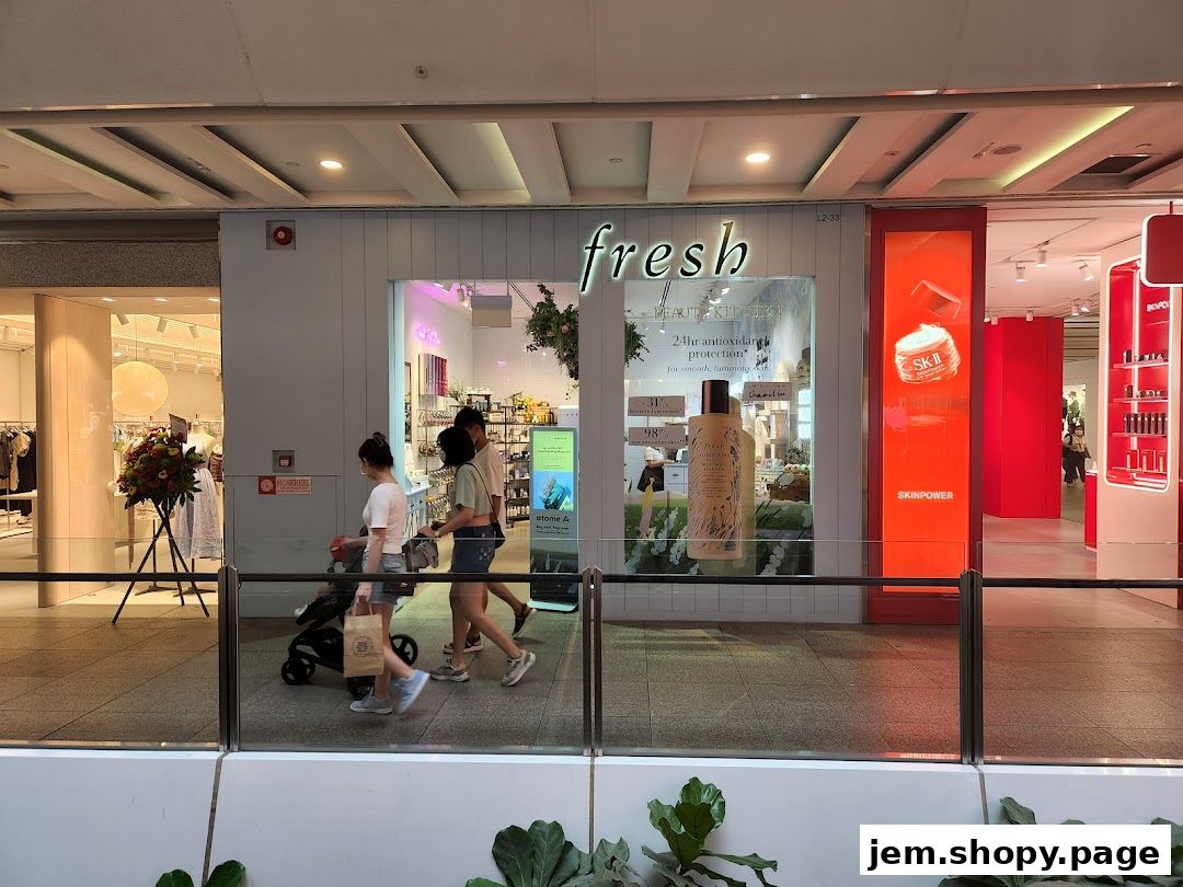 The exterior of a 'Fresh' beauty store with products displayed in the window.