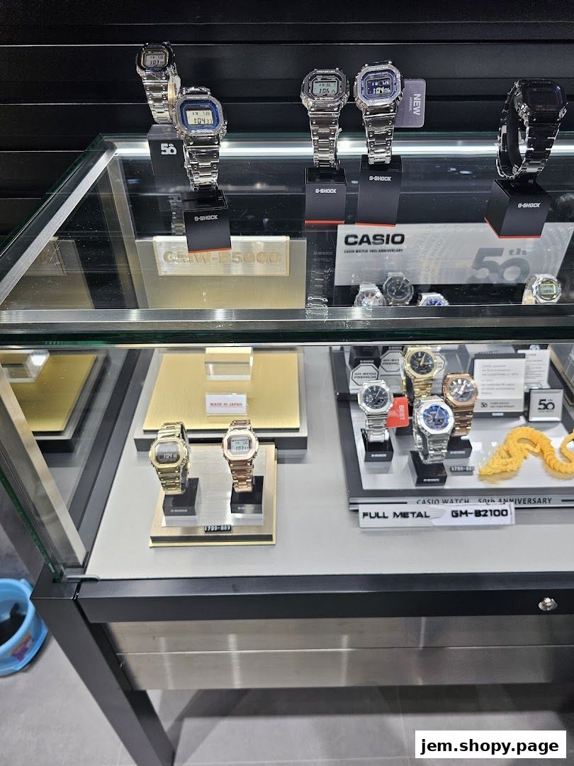 Display case showcasing various G-SHOCK CASIO watches, including full metal and anniversary models.