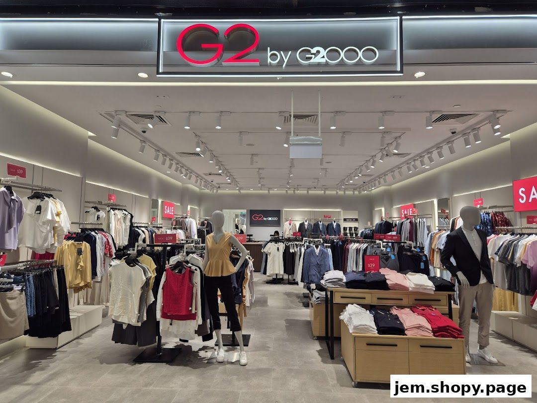 Interior view of a G2000 clothing store showcasing apparel and mannequins.