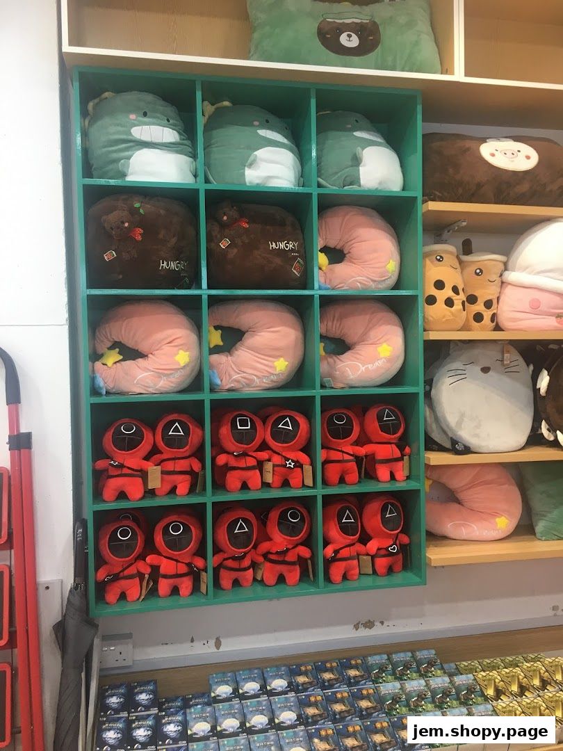 A display shelf filled with various plush toys, including characters and animal-shaped pillows.