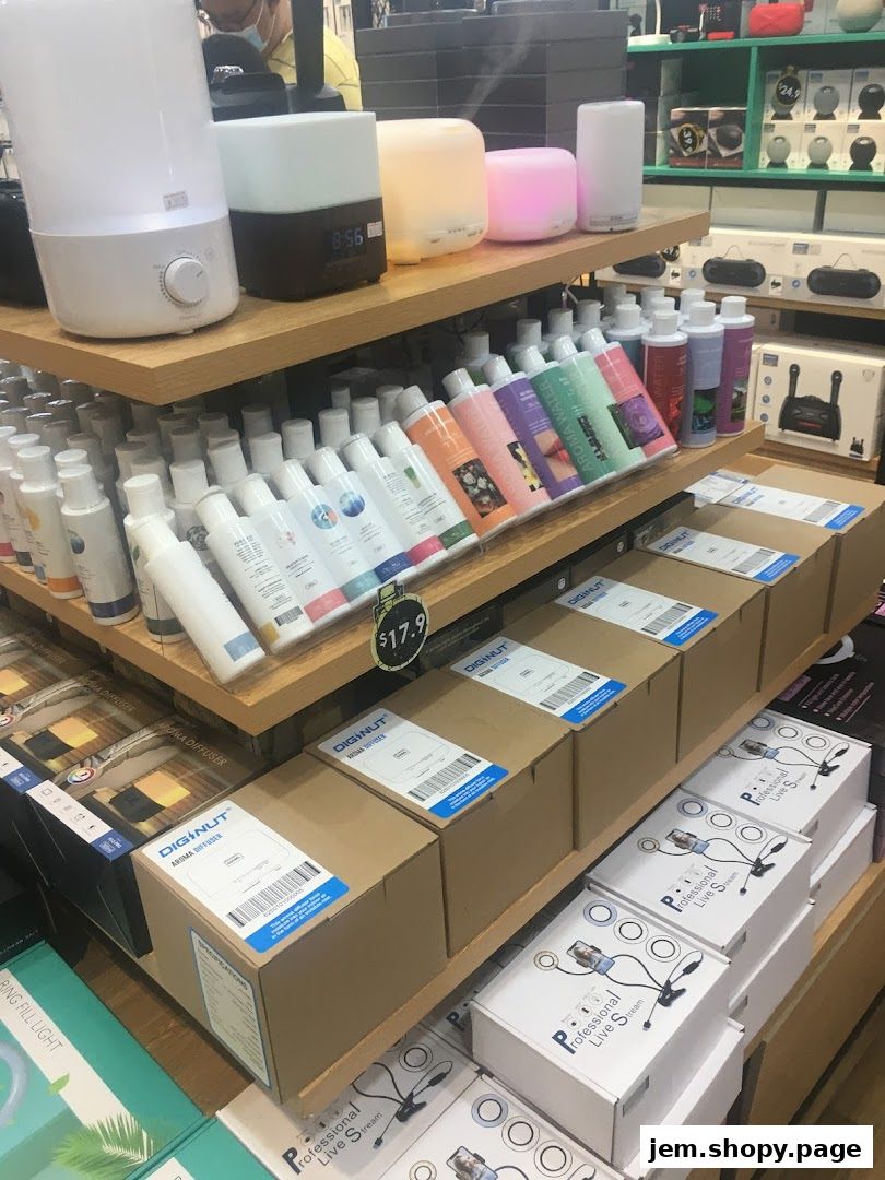 Shelves display aroma diffusers, essential oils, and live stream kits at Gadget Mix.