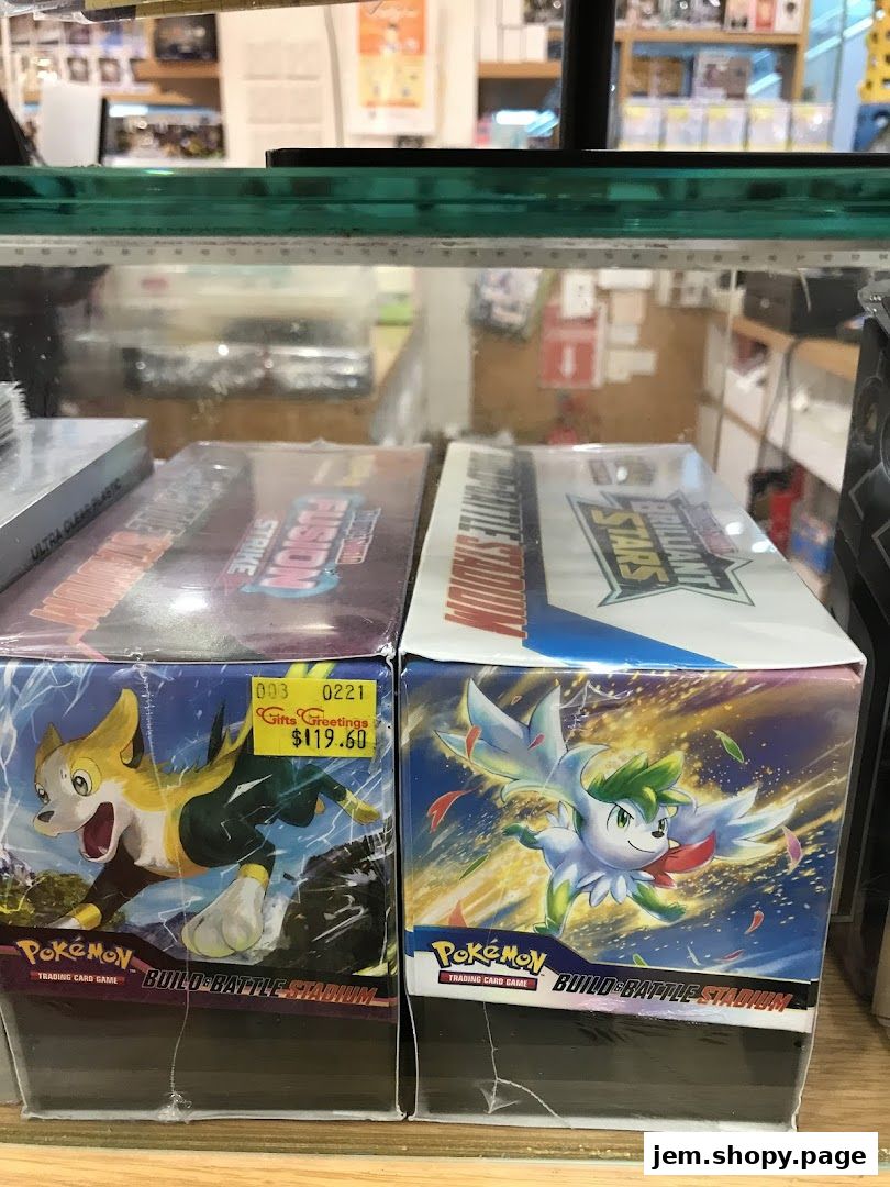 Two Pokemon Build & Battle Stadium boxes displayed on a shelf in a retail store.