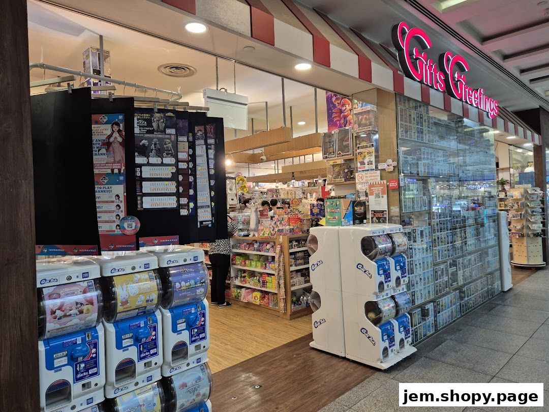 Exterior view of Gifts Greetings shop with gachapon machines and merchandise displays.