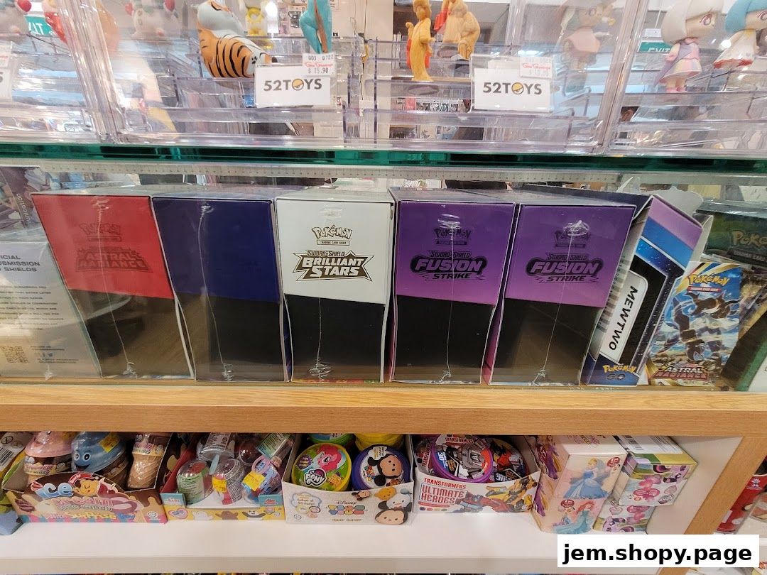 Shelves display Pokémon card booster boxes, collectible toys, and various novelty items.