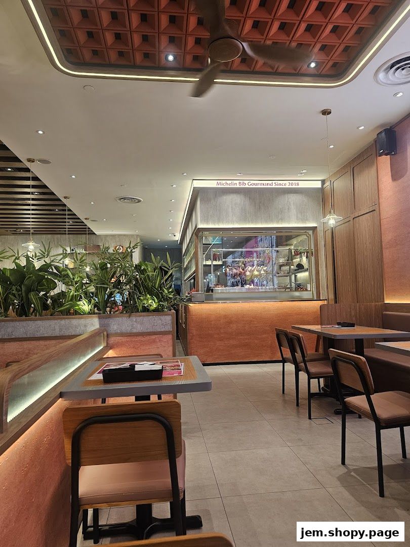Interior view of Go-Ang Pratunam Chicken Rice JEM, a Michelin Bib Gourmand restaurant.