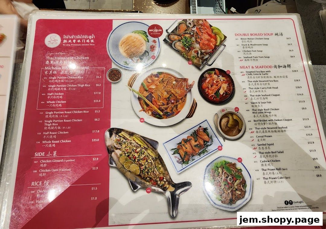 A menu from Go-Ang Pratunam Chicken Rice featuring various Thai dishes and soups.