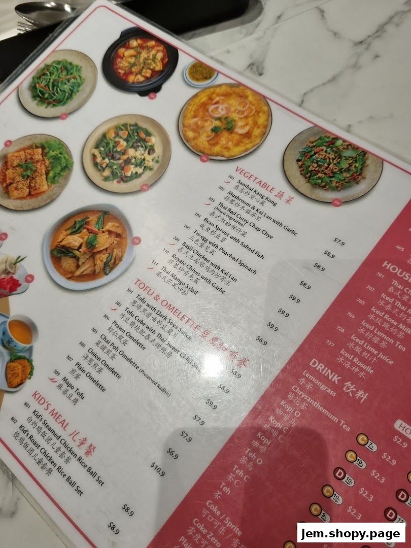 A close-up view of a restaurant menu featuring various dishes and drinks with prices.