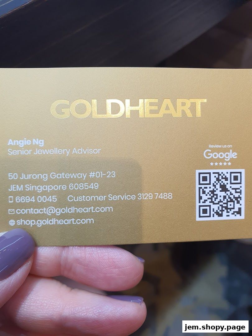 A business card for Goldheart Jewelry, featuring contact information and a QR code.