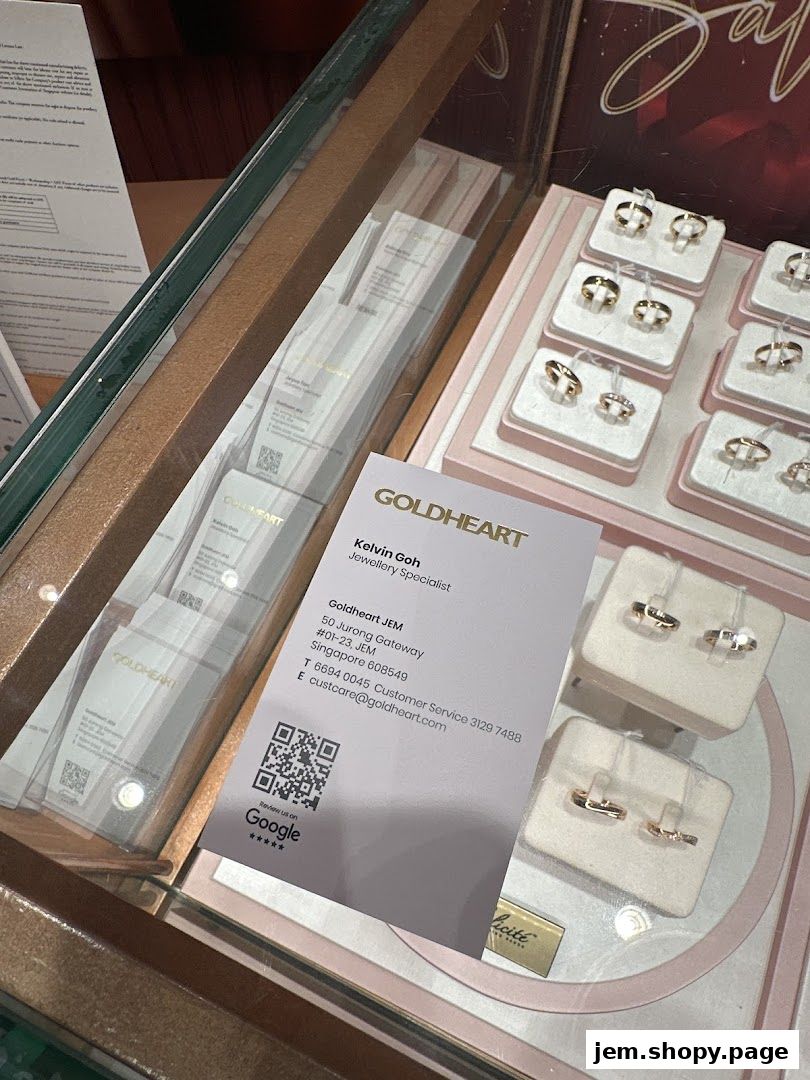 A display case showcasing various gold rings at Goldheart Jewelry.