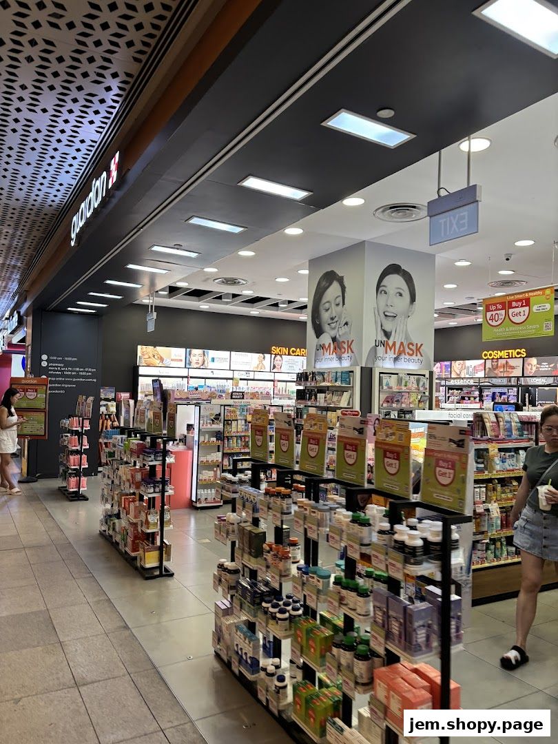 Interior view of a Guardian Health & Beauty Pharmacy with shelves stocked with health and beauty products.