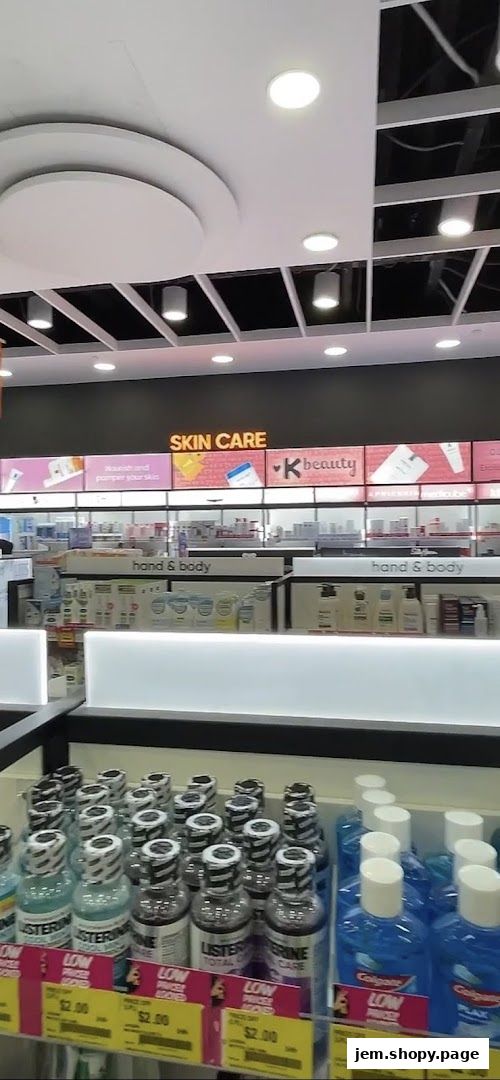 A retail store interior displaying skincare, hand and body products, and oral care items.