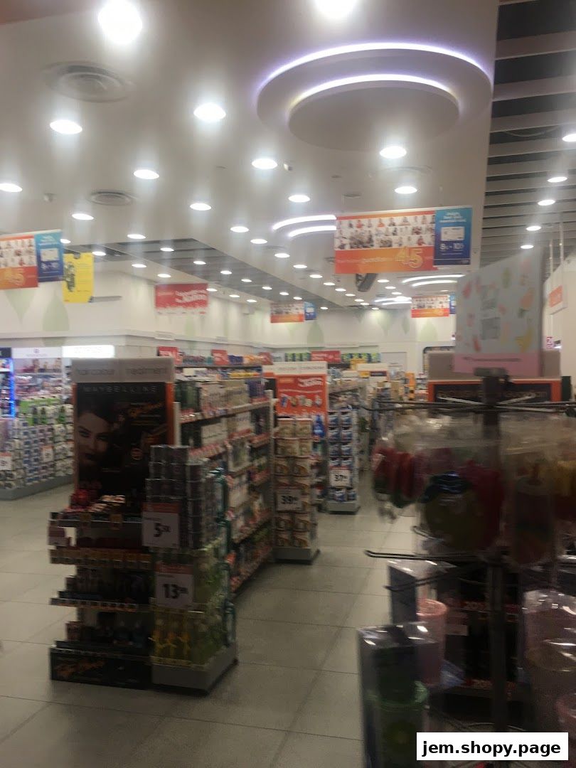 Interior view of a Guardian Health & Beauty store with shelves stocked with various products.