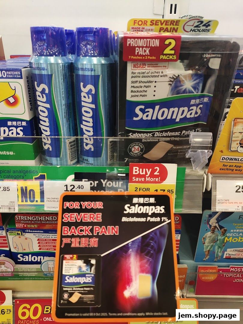 A display of Salonpas pain relief patches and sprays at a Guardian pharmacy.