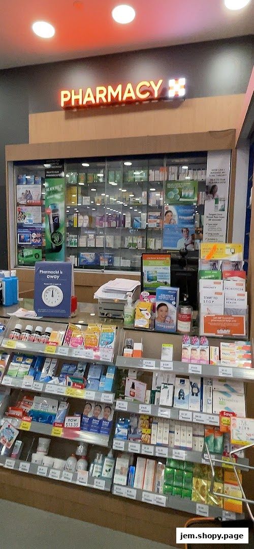 A well-stocked pharmacy counter with shelves of health and beauty products.