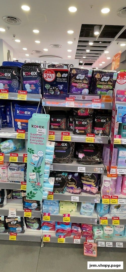 Shelves stocked with feminine hygiene products, including Kotex and Sofy brands.
