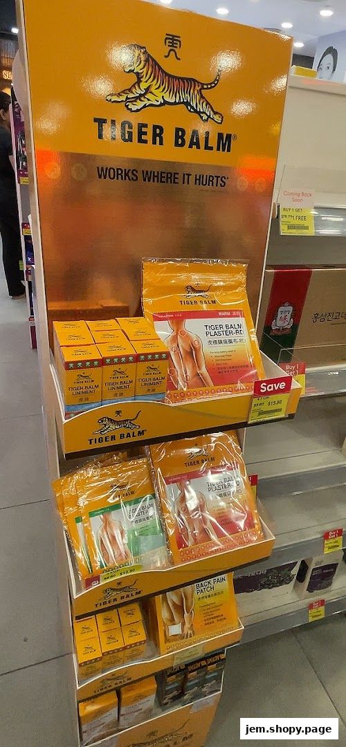 A display of Tiger Balm products including liniments and plasters for pain relief.