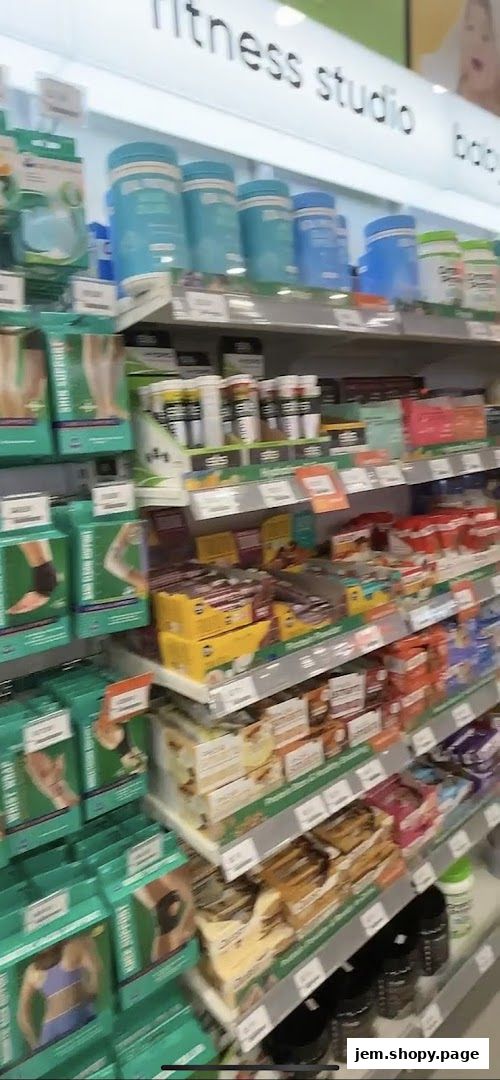 Shelves stocked with health supplements, fitness products, and pharmacy items.