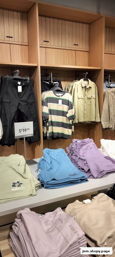 Interior view of an H&M store showcasing various apparel items on display.