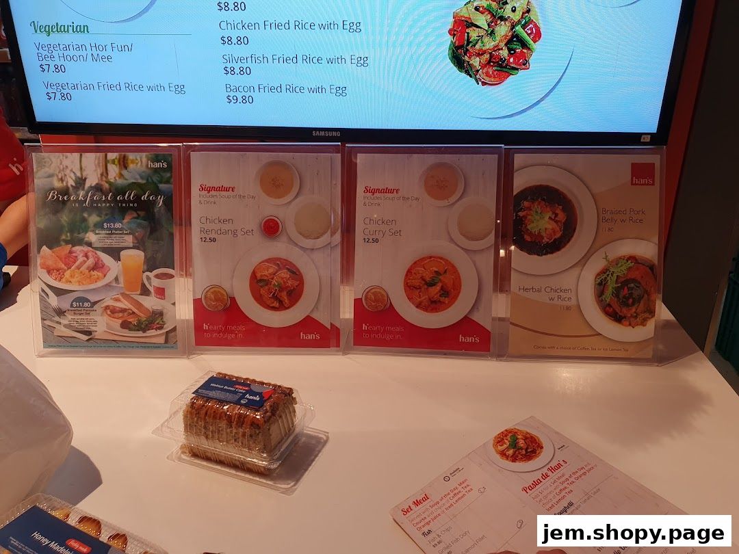 A display of menus and food items from Hans Union, showcasing breakfast and signature sets.