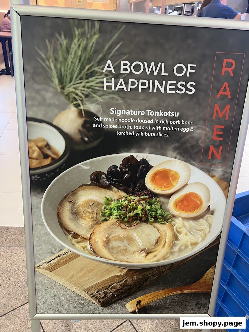 A sign advertising a Signature Tonkotsu ramen dish from Hans Union.
