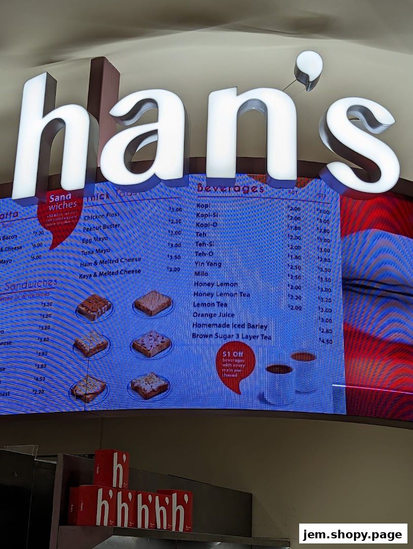 A digital menu board for Hans Union, displaying sandwiches and beverages with prices.