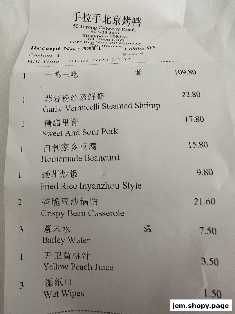 A receipt from Hand in Hand Peking Duck showing food and drink items with prices.