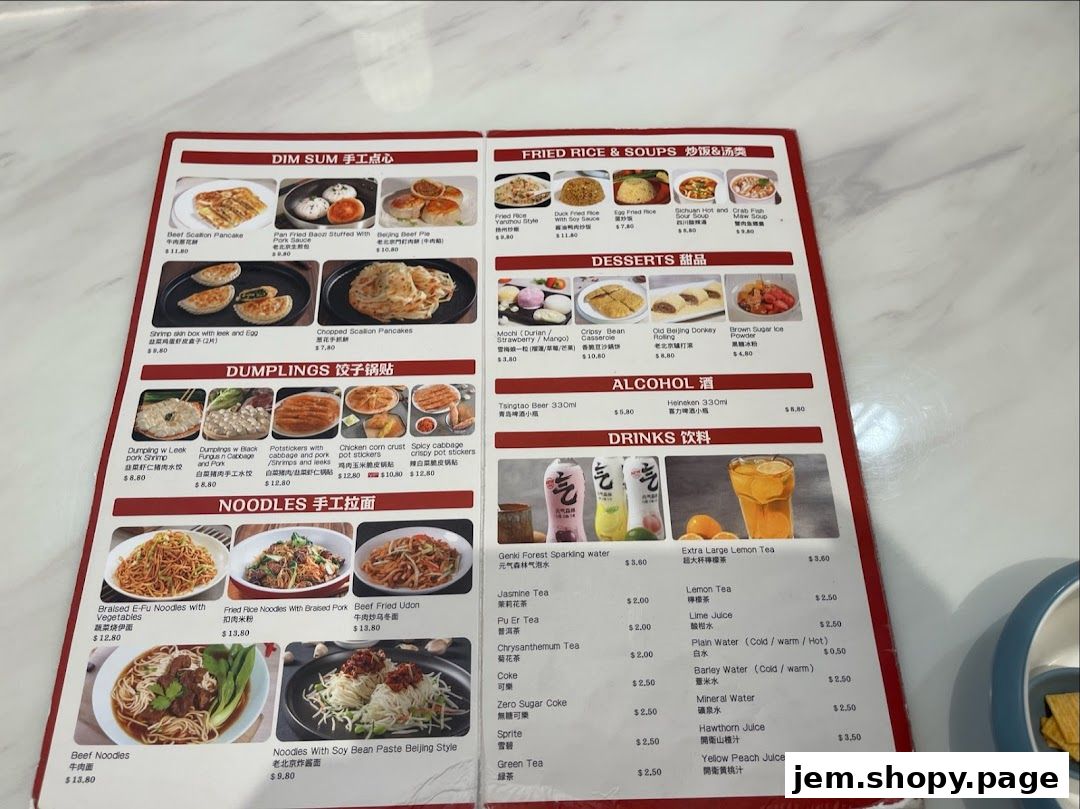 A menu displaying various Chinese dishes including dim sum, dumplings, noodles, fried rice, desserts, drinks, and alcohol.