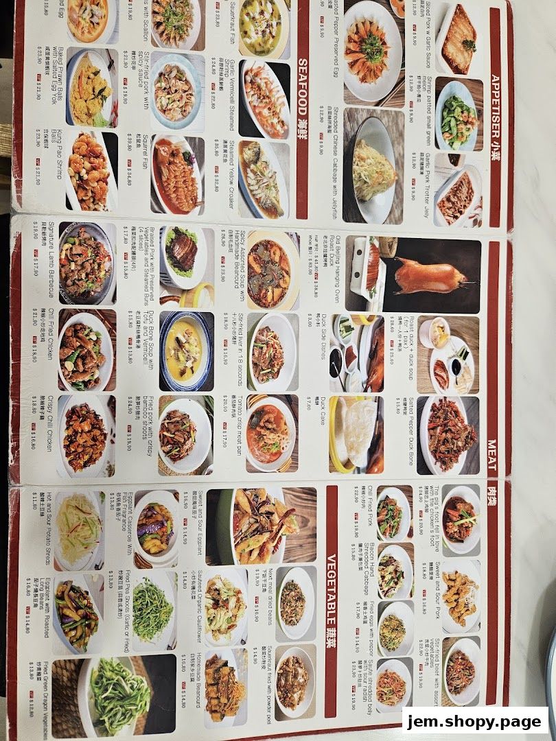 A menu from Hand in Hand Peking Duck featuring various Chinese dishes with images and prices.