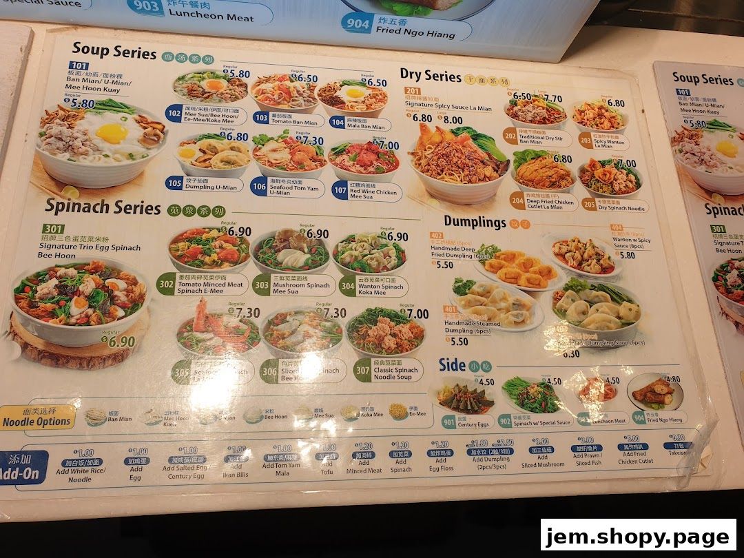 A menu board displaying various noodle soups, dry noodles, dumplings, and side dishes with prices.