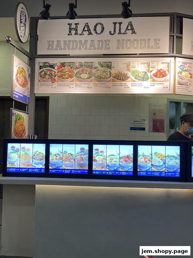 A display of noodle dishes and other food items offered at Hao Jia Handmade Noodle.