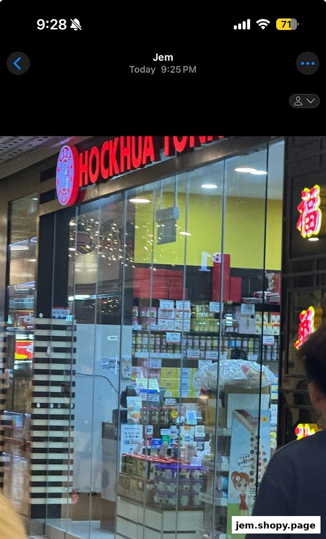 The exterior of Hockhua Tonic shop, showcasing a variety of health products and tonics.