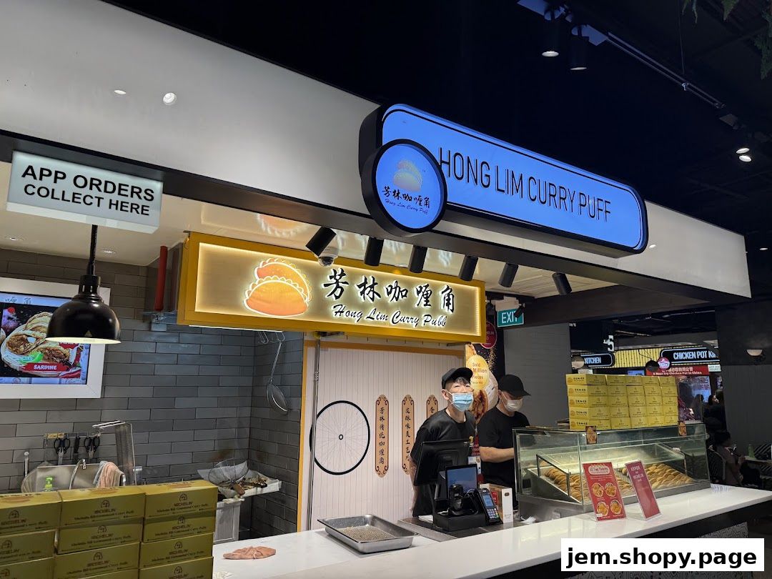 Hong Lim Curry Puff shop with staff serving customers and displaying curry puffs.