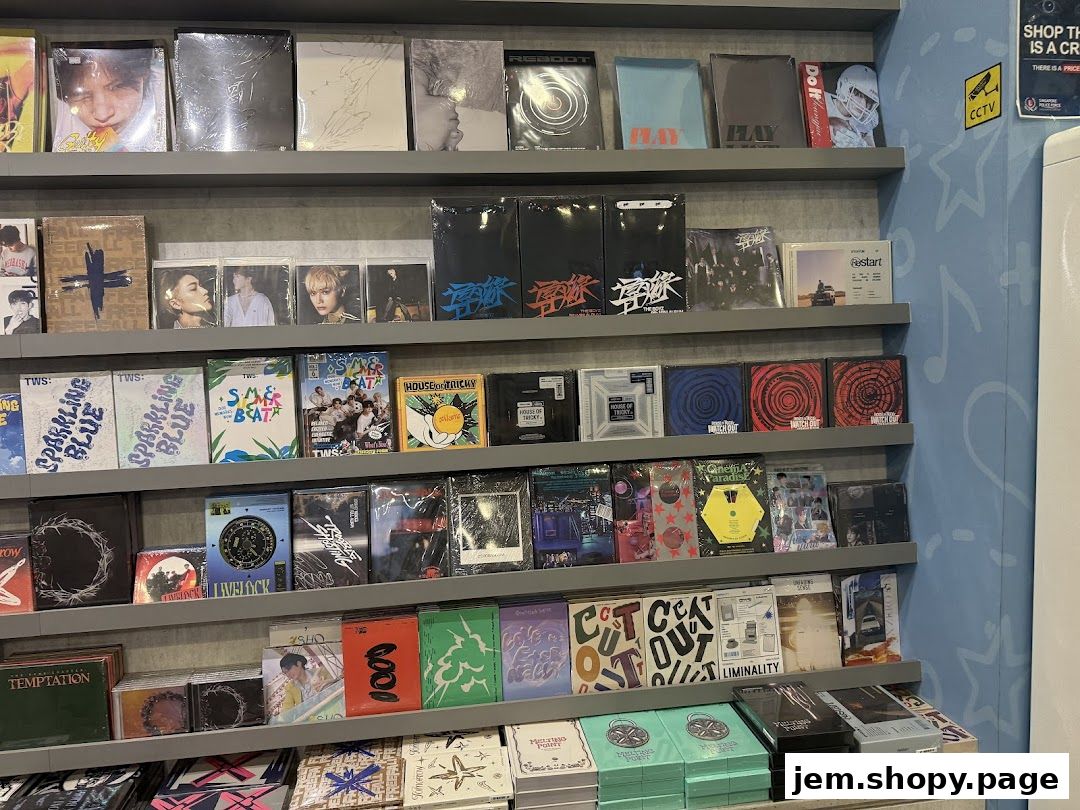 Shelves filled with K-pop albums and merchandise from House of Kpop JEM.