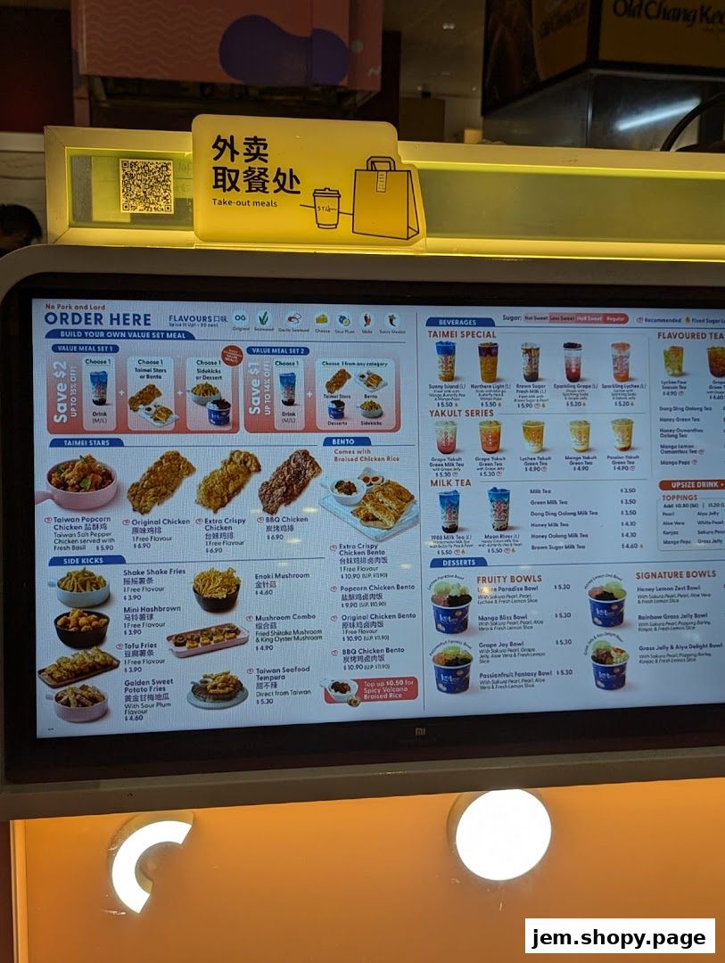 A digital menu displays various Taiwanese fried chicken, bubble tea, and bento box options.