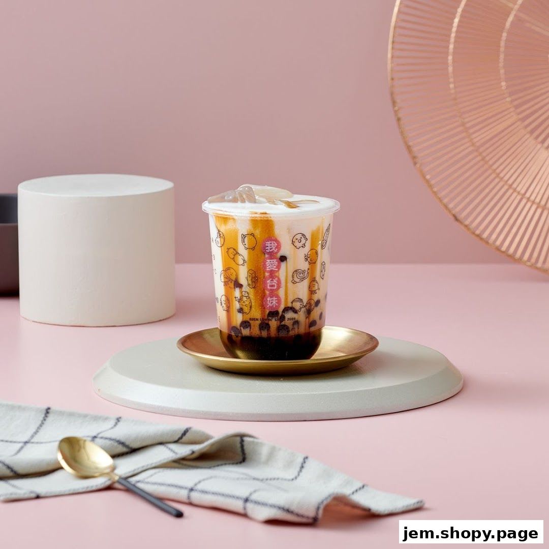 A delicious brown sugar bubble tea with pearls and cream topping.