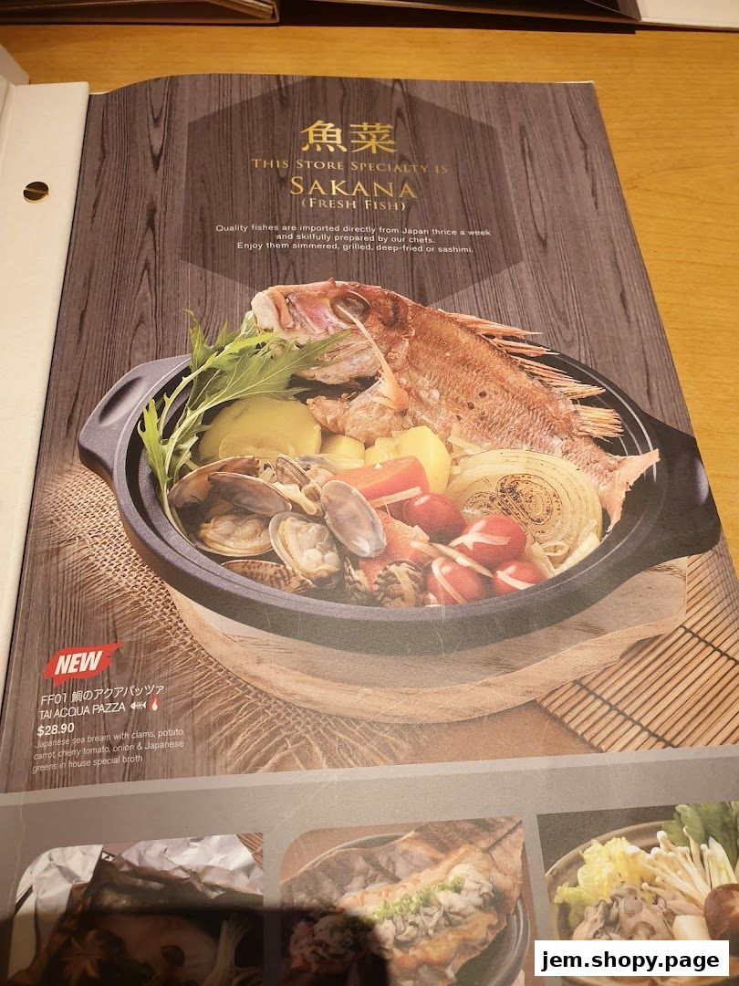 A menu page showcasing a Japanese fish dish with fresh ingredients and a description.