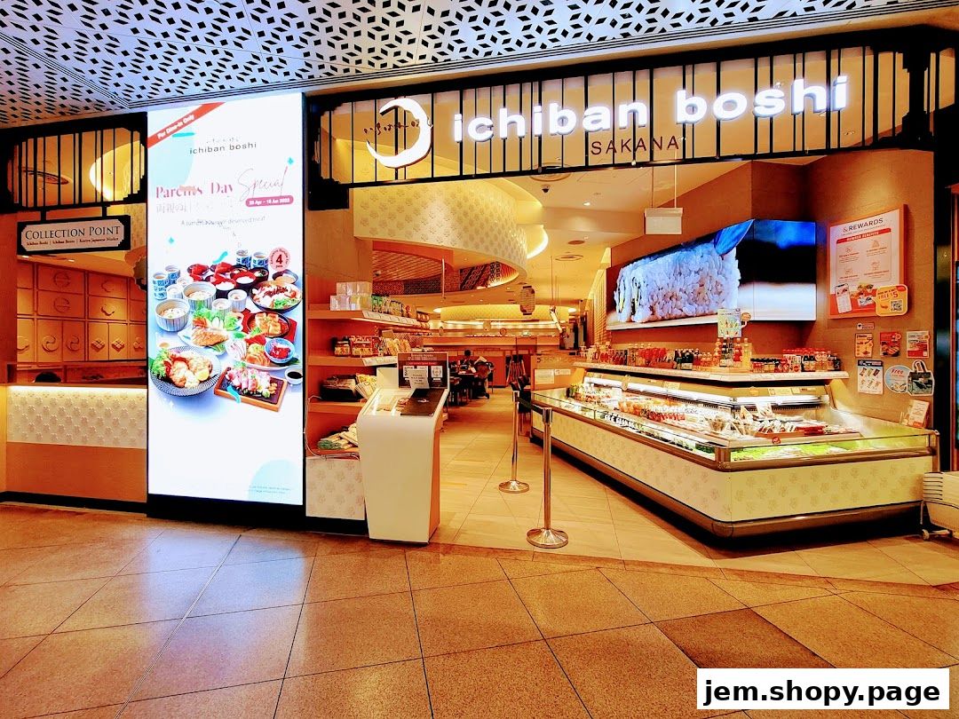 The exterior of Ichiban Boshi Sakana, a Japanese restaurant, with a display of food and a large screen.