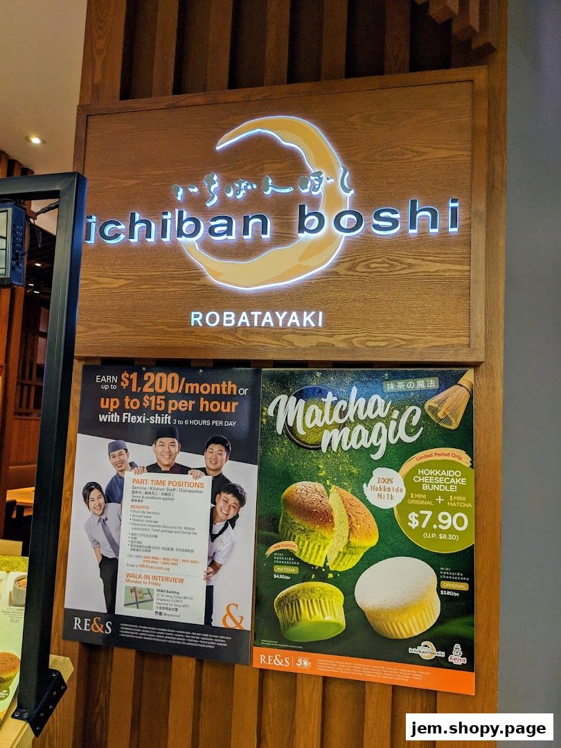 Signage for Ichiban Boshi Robatayaki restaurant, featuring job postings and a matcha cheesecake promotion.