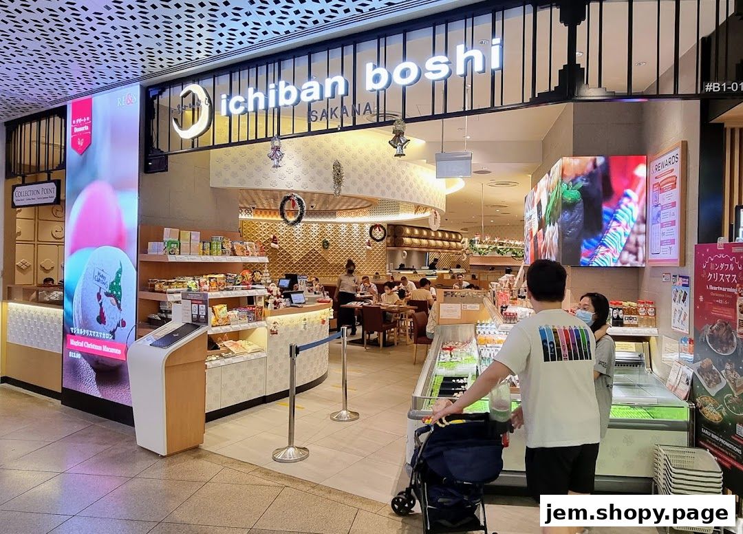 The exterior of Ichiban Boshi Sakana restaurant with a display of food and a digital advertisement.